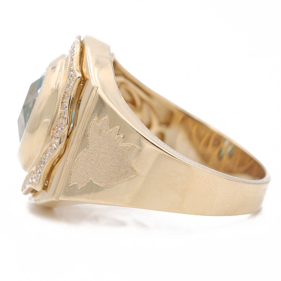A men's Yellow Gold 14k Fashion Ring with an eagle motif and diamond embellishments by Miral Jewelry.