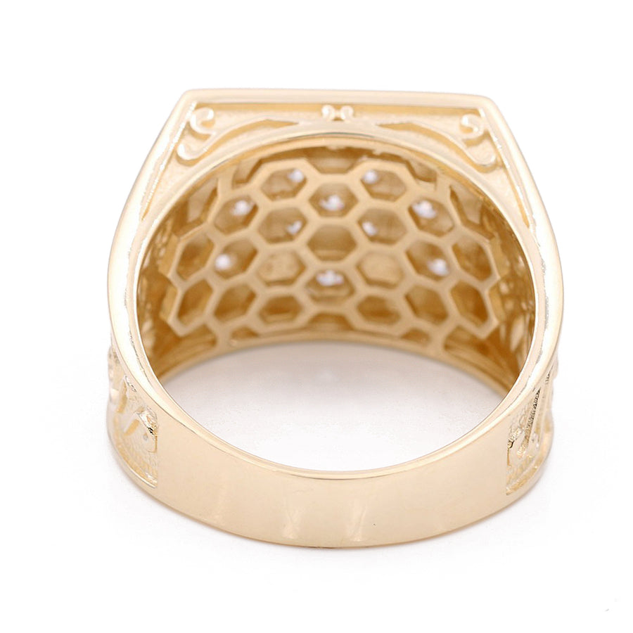 A Miral Jewelry yellow gold 14k fashion ring adorned with diamonds in the center.