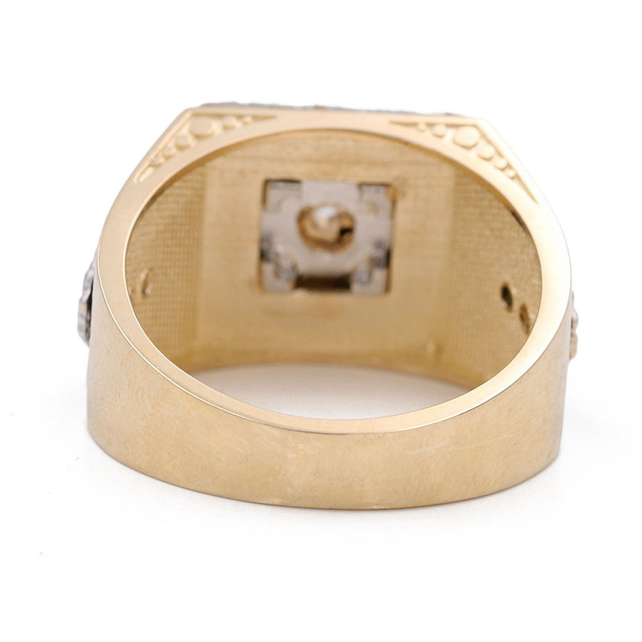 A statement piece Miral Jewelry men's Yellow Gold 14k Fashion Ring With Onyx with a diamond in the center.