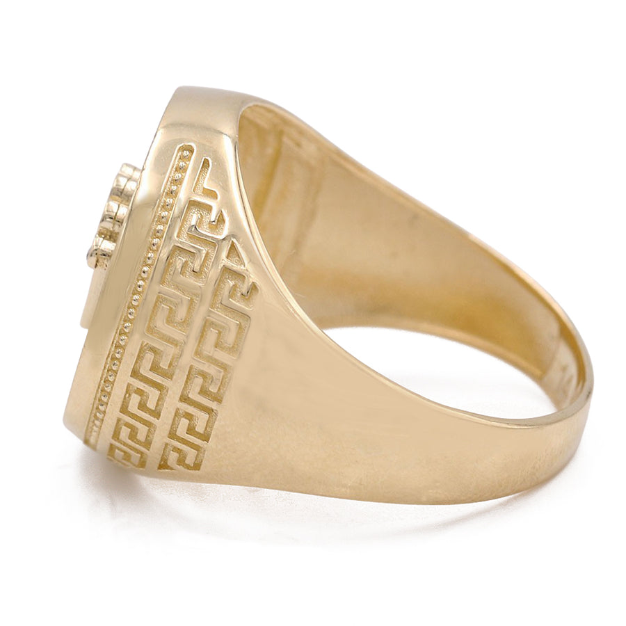A Miral Jewelry 14K Yellow Gold and Onyx Men's Fashion Ring with an intricate design perfect for men's fashion.