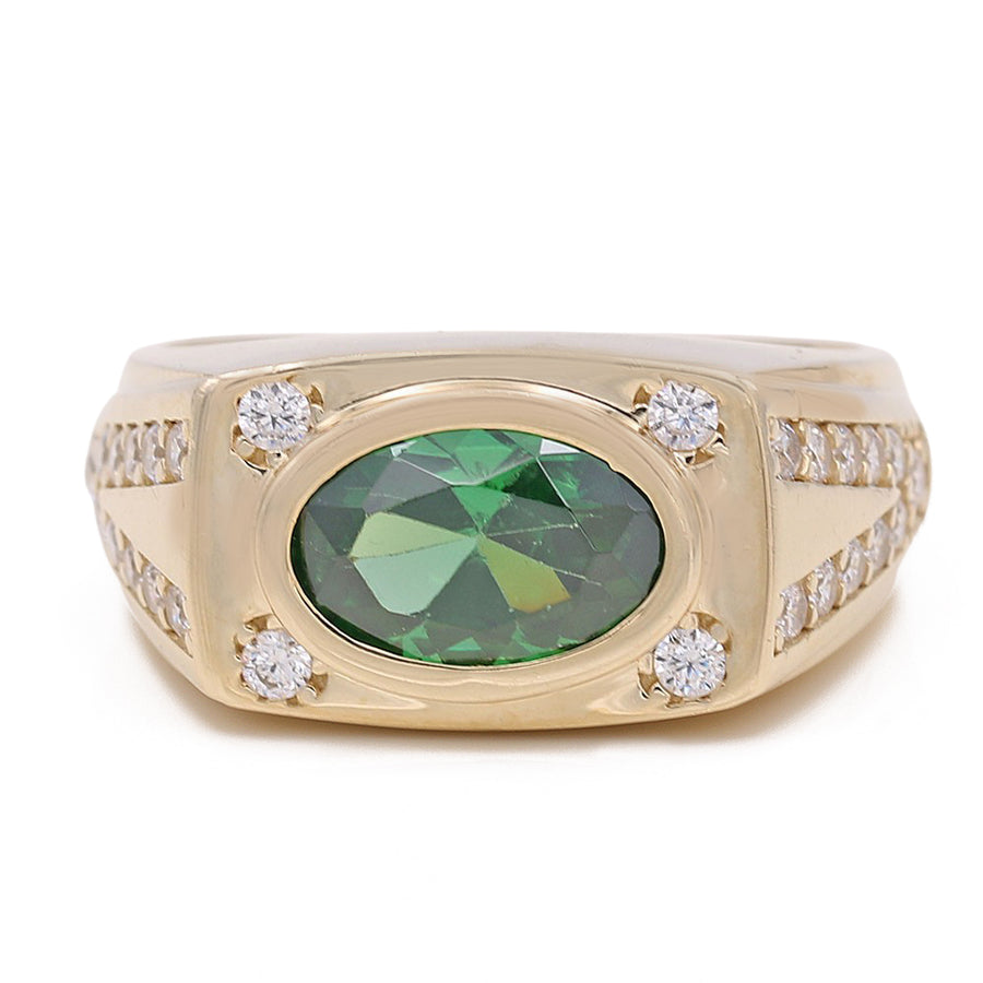 A Yellow Gold 14k Fashion Ring With Green Cz from Miral Jewelry.