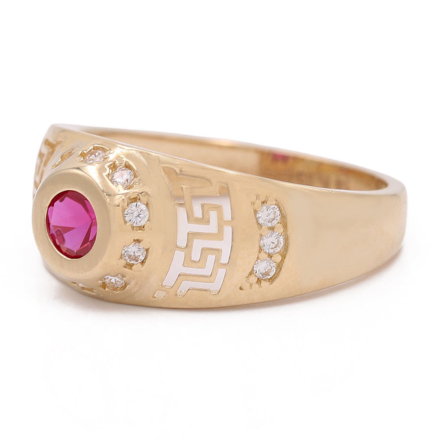A Yellow Gold 14k Fashion Ring with a ruby stone, accented by diamonds, by Miral Jewelry.