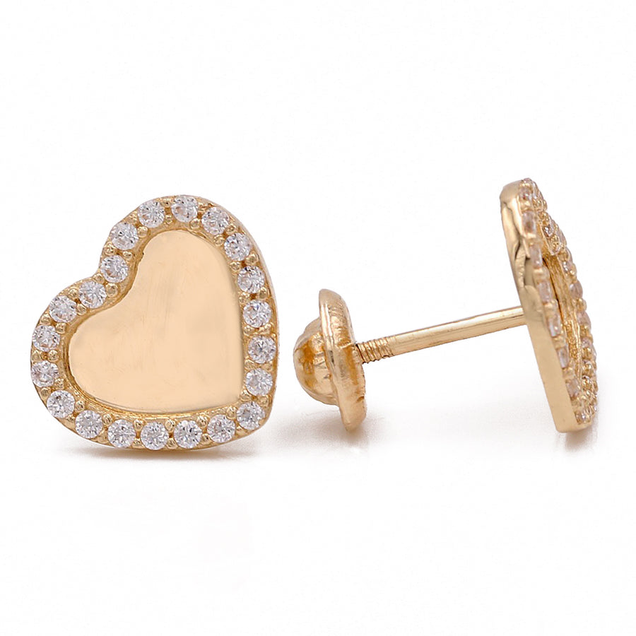 A pair of Miral Jewelry Yellow Gold 14k Heart Earrings with diamonds, perfect for women or kids.