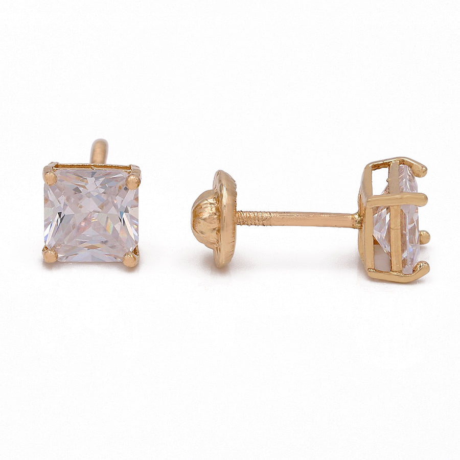 Women's princess cut cubic zirconia stud earrings in yellow gold. (product)

Yellow Gold 14k Square Stud Earrings by Miral Jewelry.