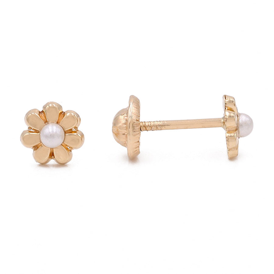 A pair of Miral Jewelry's Yellow Gold 14k Flower Earrings With Pearl.