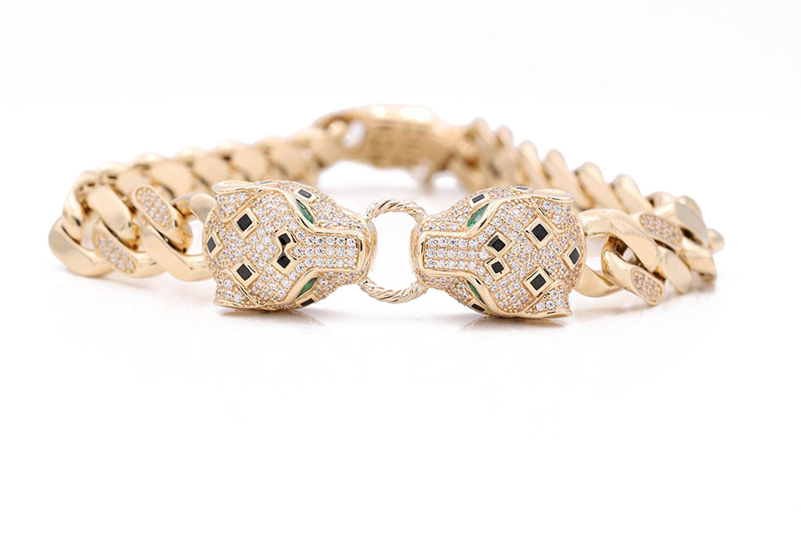A Yellow Gold 14k Fashion Bracelet with emeralds and diamonds, perfect for fashion-forward men, by Miral Jewelry.