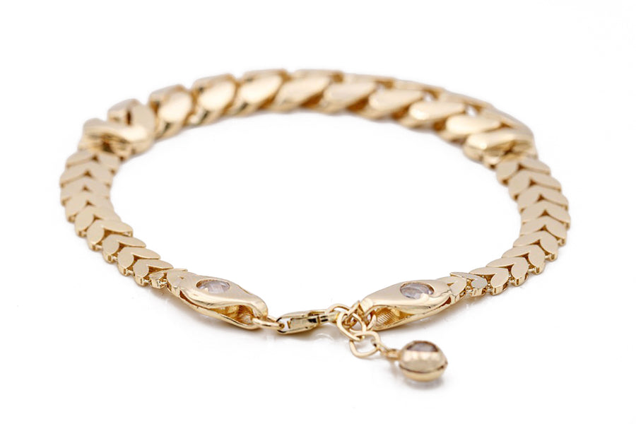 A Yellow Gold 14k Fashion Italian Bracelet With Cz bracelet with a diamond clasp for women by Miral Jewelry.
