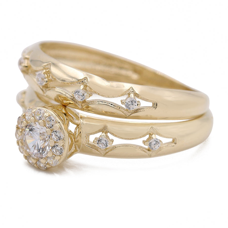 A unique Miral Jewelry Yellow Gold 14k Bridal Ring Set set with diamonds, featuring a stunning Miral Jewelry Yellow Gold 14k Bridal Ring Set.