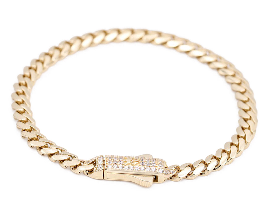 A Yellow Gold 14k Baby Monaco Ankle Bracelet 10" Cz with a diamond clasp, made by Miral Jewelry.