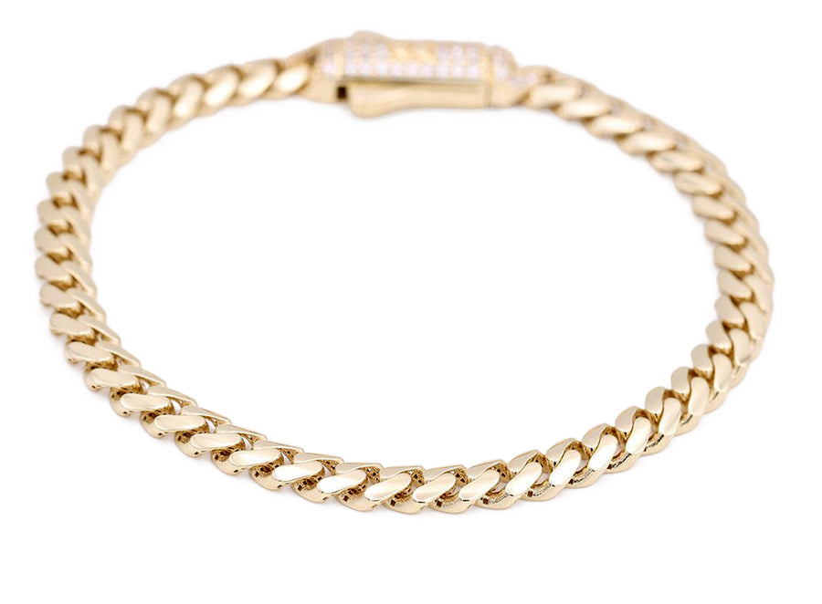 A Yellow Gold 14k Baby Monaco Ankle Bracelet 10" Cz with a diamond clasp by Miral Jewelry.