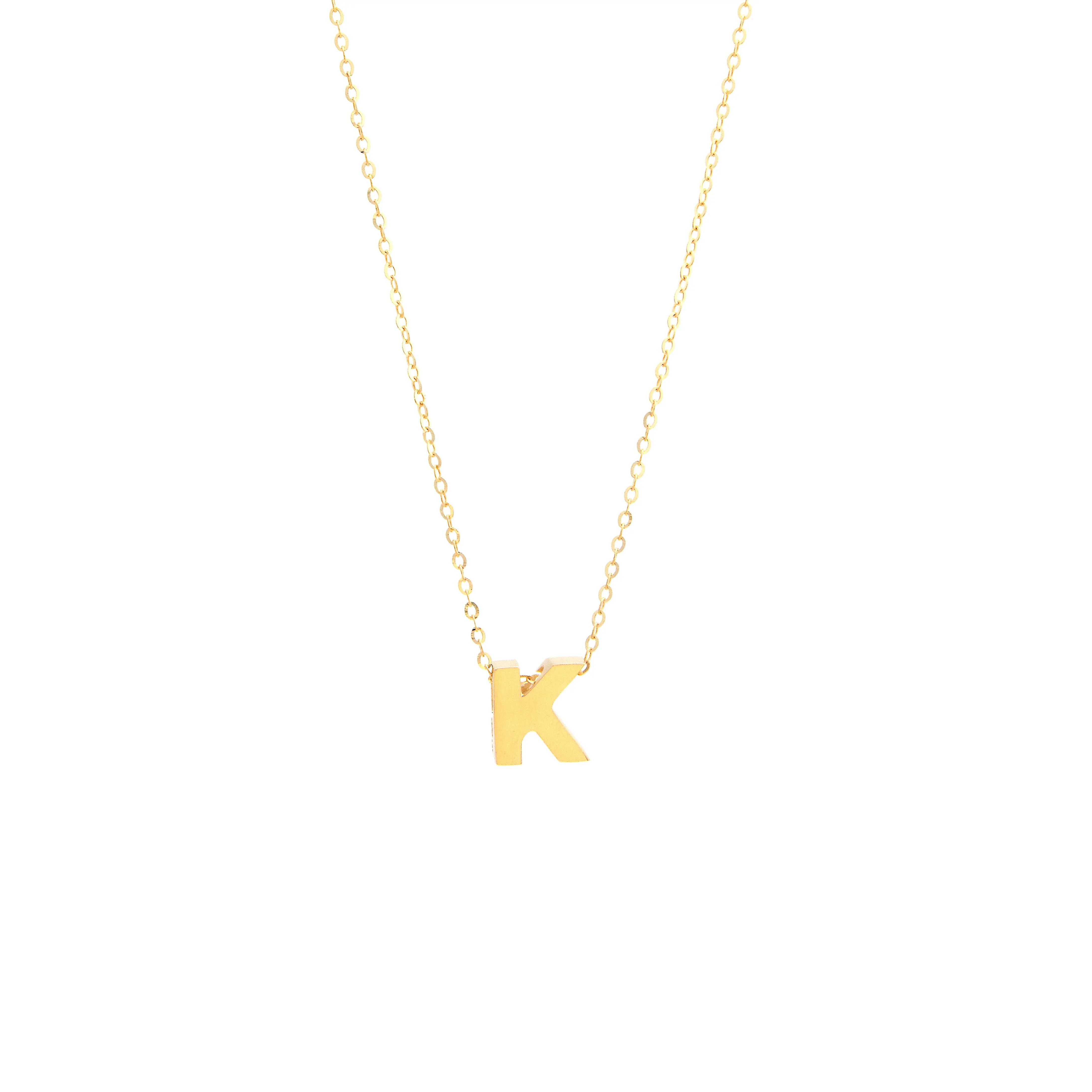 Initial K in 14k Yellow Gold Necklace with letter 'k' pendant on a white background by Miral Jewelry.