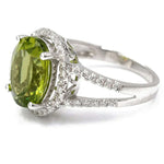White 14 Karat Fashion Ring Size 7 With 0.45Tw Round Diamonds And 4.88Tw Oval Peridots - Miral Jewelry