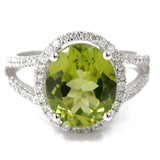 White 14 Karat Fashion Ring Size 7 With 0.45Tw Round Diamonds And 4.88Tw Oval Peridots - Miral Jewelry