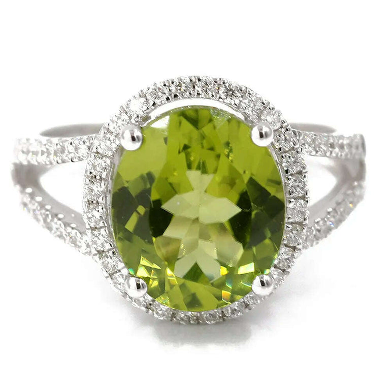 White 14 Karat Fashion Ring Size 7 With 0.45Tw Round Diamonds And 4.88Tw Oval Peridots - Miral Jewelry